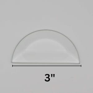 May include: A clear, semi-circular glass dome with a 3-inch diameter.