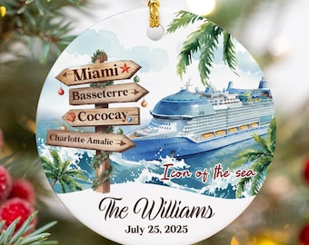 May include: Round ceramic Christmas ornament featuring a cruise ship on a blue ocean with palm trees. The ornament has a signpost with destinations: Miami, Basseterre, Cococay, and Charlotte Amalie. The text "Icon of the sea", "The Williams", and "July 25, 2025" are also visible.