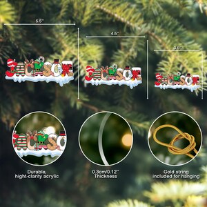 Puede incluir: Un adorno de nombre personalizado con las letras de JACKSON decoradas con temas navide&ntilde;os como renos, mu&ntilde;ecos de nieve y regalos. Disponible en anchos de 13,97, 11,43 y 8,89 cm, con un grosor de 0,3 cm e incluye un cord&oacute;n dorado para colgar.