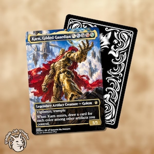 May include: A rectangular trading card titled Karn, Gilded Guardian, featuring a golden golem with a red cape standing against a floating landscape. The card text includes Legendary Artifact Creature, Golem, 5/5, and game rules. A second card with a black and white ornate floral pattern is partially visible behind it.