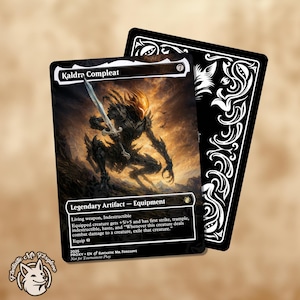 May include: Two collectible cards. The front card features a dark fantasy illustration of a creature holding a sword, with the text "Kaldra Compleat." The back card is black with white decorative flourishes. A small logo of a dog is in the lower left corner.