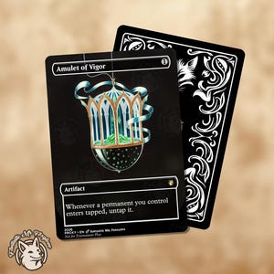 May include: A black game card titled Amulet of Vigor featuring a gold and blue cage-like pendant with green liquid inside. The card text reads Artifact and Whenever a permanent you control enters tapped, untap it. A second card back is visible.