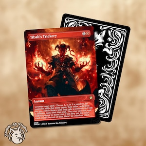 May include: A red and black Magic: The Gathering card featuring Tibalt, a red-skinned demon with horns, holding flames in his hands. The card text reads "Tibalt's Trickery" and is an instant spell that counters a target spell and exiles cards from the top of a player's library.