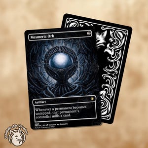 May include: A fantasy card depicting a Mesmeric Orb, a dark, spherical artifact with a glowing core. The card is labelled "Artifact" and includes game instructions. The card's reverse is black with white decorative patterns.