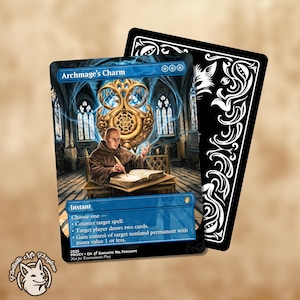 May include: A Magic: The Gathering card titled "Archmage's Charm" featuring an illustration of a robed figure in a library setting. The card has a blue border and text describing its effects. A black card with white decorative elements is behind it.