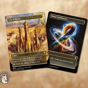 May include: Two collectible trading cards. One card features a desert landscape with golden towers and the text "City of Brass." The other card has a swirling, colorful design with the text "Mana Confluence."