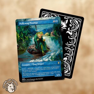 May include: A fantasy card featuring a green frog wizard sitting on a rock in a river. The card is titled "Pollywog Prodigy" and has a black card behind it. The card has a 1/3 power and toughness.