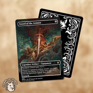 May include: A fantasy card featuring the "Sword of the Animist" with a detailed illustration of a sword in a forest setting. The card has a black back with white decorative elements. The text includes "Legendary Artifact - Equipment".