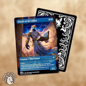 May include: A Magic: The Gathering card featuring "Oracle of the Alpha," a Bird Wizard character with blue and gold armor, holding a book. The card has a blue border and text. A black card with white decorative elements is behind it.
