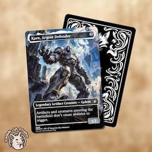 May include: A trading card titled Karn, Argent Defender featuring a metallic golem illustration. The card text reads Legendary Artifact Creature - Golem and includes game rules. A second card with a black and white ornate pattern is partially visible behind it.