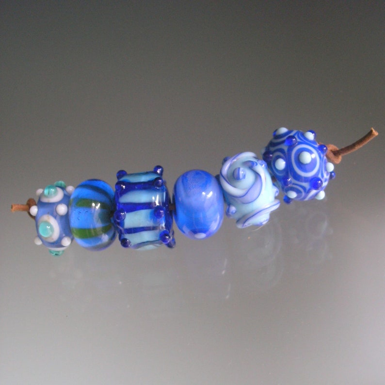 Blue Boro Lampwork Orphan Beads Turquoise Dots Stripes Swirls Light and Dark Blue Yellow Accents 12 Bead Set