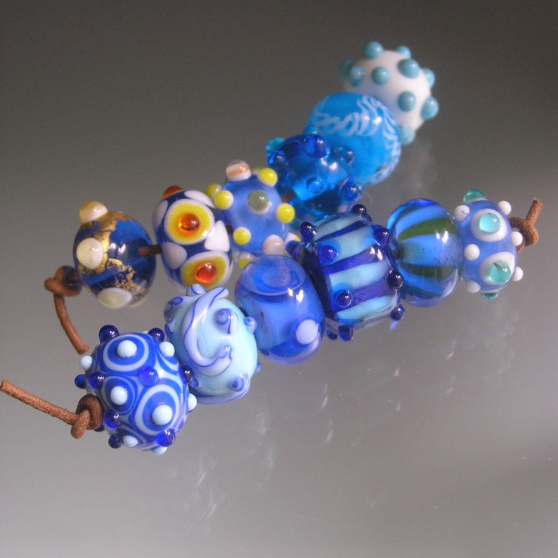 Blue Boro Lampwork Orphan Beads Turquoise Dots Stripes Swirls Light and Dark Blue Yellow Accents 12 Bead Set