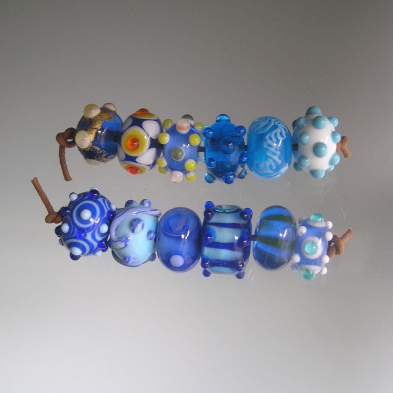 Blue Boro Lampwork Orphan Beads Turquoise Dots Stripes Swirls Light and Dark Blue Yellow Accents 12 Bead Set