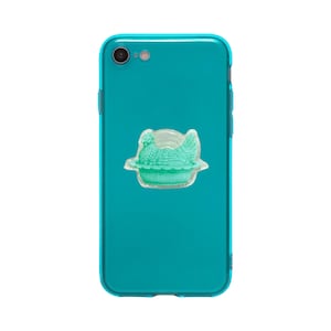 May include: A white ceramic mug with a black handle and the text "But first, coffee" in a handwritten style. The mug is on a white surface. The mug is 4 inches tall.