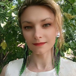 Snake earrings, beaded earrings, black and green with snakes, long earrings, fringe earrings, boho style earrings, beaded earrings,