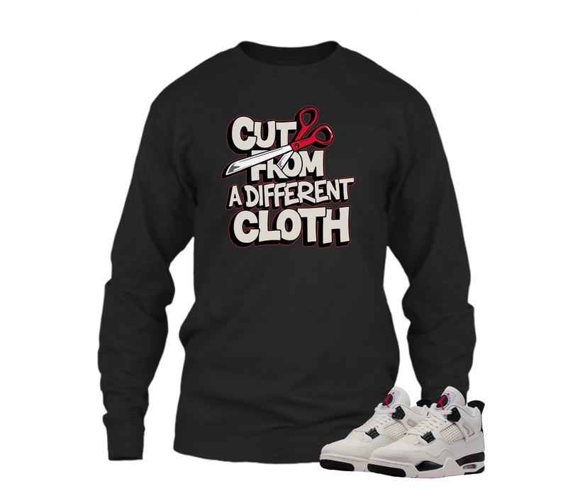 May include: Black long-sleeve shirt with the text "CUT FROM A DIFFERENT CLOTH" in white and red. The image also shows a pair of white and black sneakers.