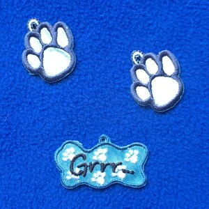 Actual Appliques - Not a download - 2 Puppy Paw Prints plus Grrr... Sew-on Appliques about 1" high x 1" x 1.5"  wide WRIGHTS Discontinued