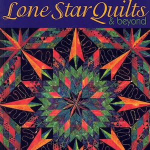 Pode incluir: Capa do livro "Lone Star Quilts & Beyond" de Jan Krentz. Apresenta um design de colcha vibrante com motivos de estrelas em tons de laranja, verde, vermelho e azul sobre um fundo escuro. O texto "STEP-BY-STEP PROJECTS AND INSPIRATION" está na parte inferior.