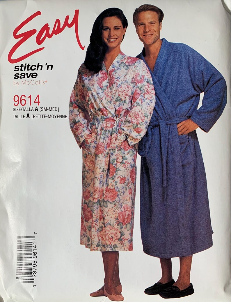 May include: A sewing pattern envelope for Easy stitch 'n save by McCall's 9614, size A [SM-MED]. The front displays two robes: one with a pink and green floral print on a white background, and one in solid blue. Both feature long sleeves and a tie belt.