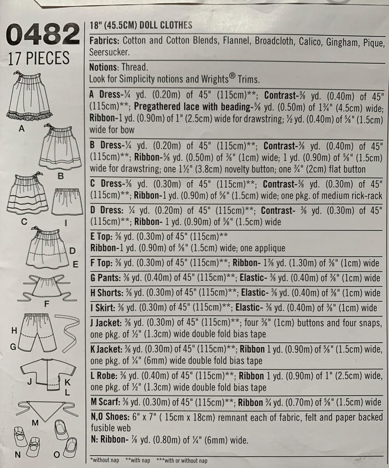 May include: A Simplicity sewing pattern envelope for 18-inch doll clothes, labeled 0482, featuring 17 pieces including dresses, tops, pants, shorts, skirts, jackets, a robe, a scarf, and shoes, with detailed fabric and notion requirements listed.