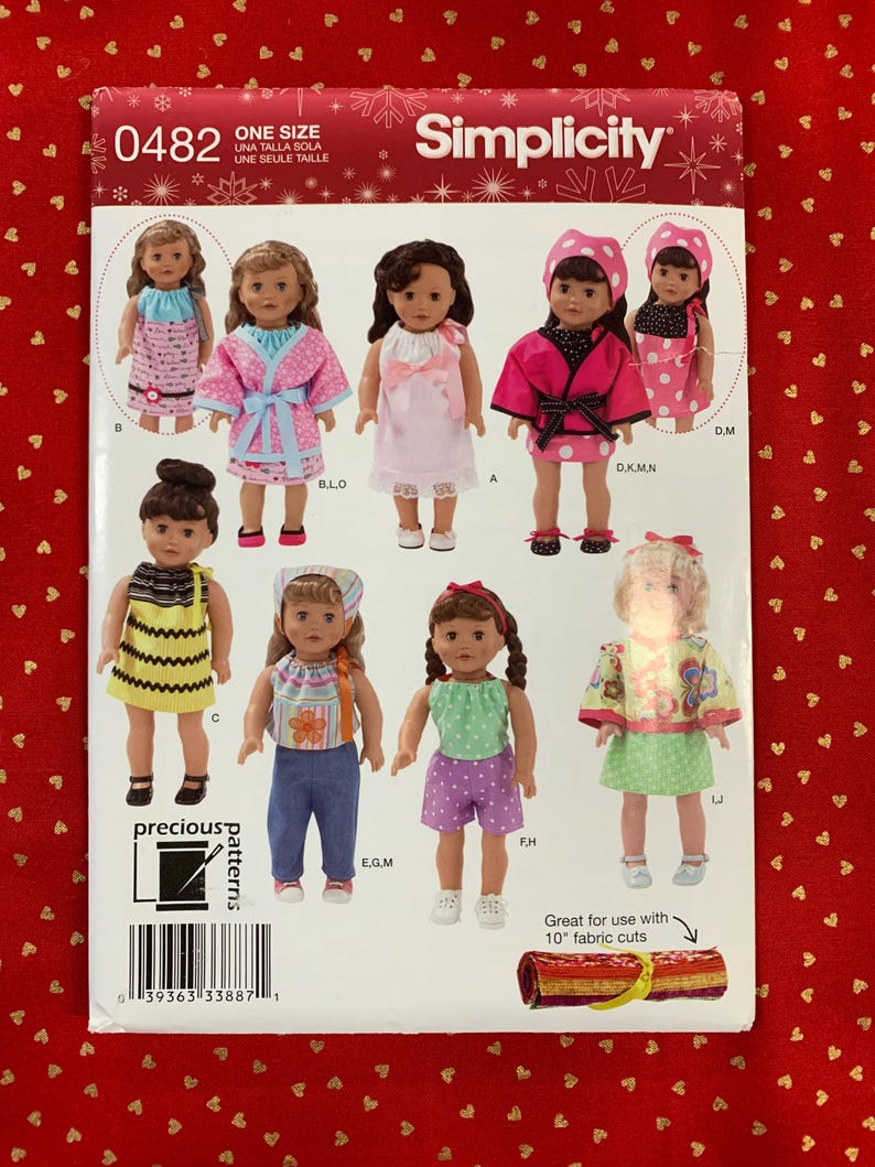 May include: A Simplicity sewing pattern envelope 0482 for one size doll clothing. The front displays illustrations of eight dolls wearing various outfits including dresses, robes, tops, pants, and shorts with floral, polka dot, and striped patterns.
