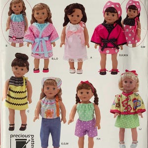 May include: A Simplicity 0482 sewing pattern envelope featuring illustrations of dolls wearing various handmade outfits including dresses, tops, pants, and jackets. The package includes the text Precious Patterns and a barcode.
