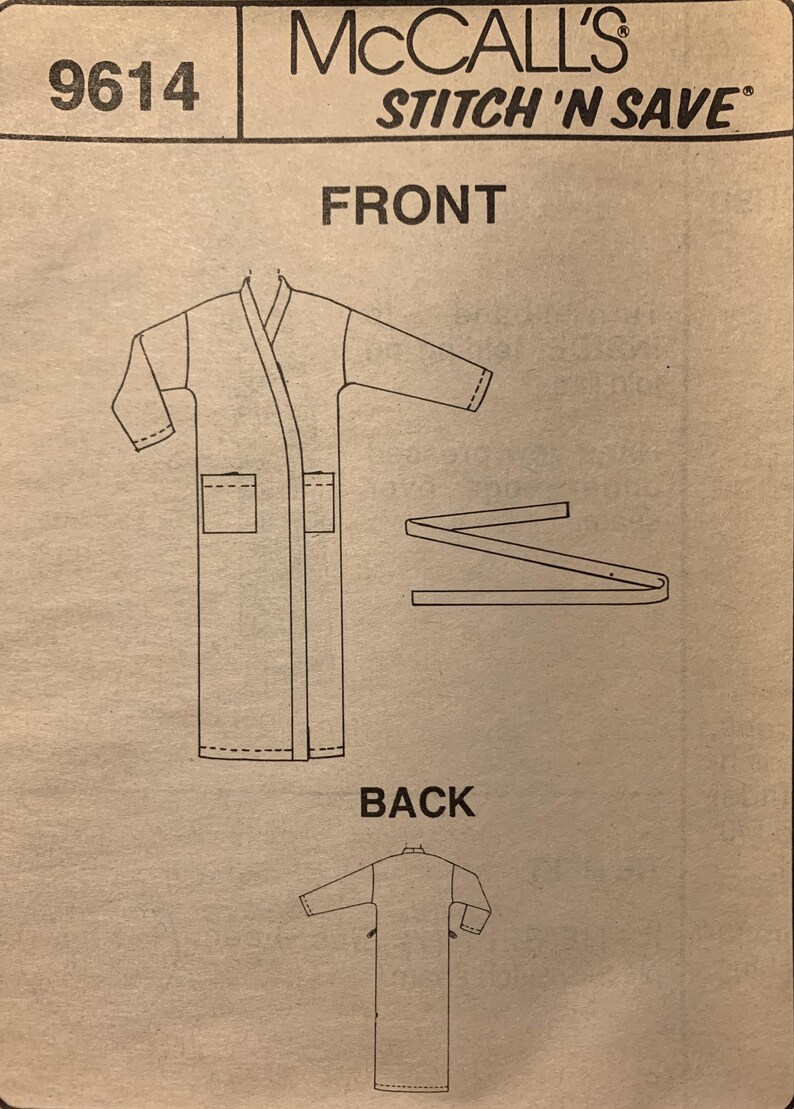 May include: A McCall's Stitch 'N Save 9614 sewing pattern envelope featuring a line drawing of a robe with long sleeves, two front pockets, and a separate tie belt. The design shows both front and back views of the garment on a tan background.