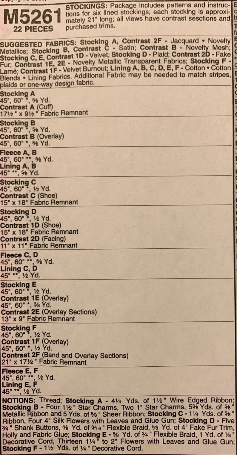 May include: A sewing pattern instruction sheet labeled M5261 for six lined stockings, each approximately 21 inches long. The document lists 22 pieces, suggested fabrics including jacquard, satin, velvet, and faux fur, and required notions like ribbon, star charms, and buttons.