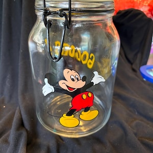 Mickey Mouse Glass Canister with seal lid/black clasp.