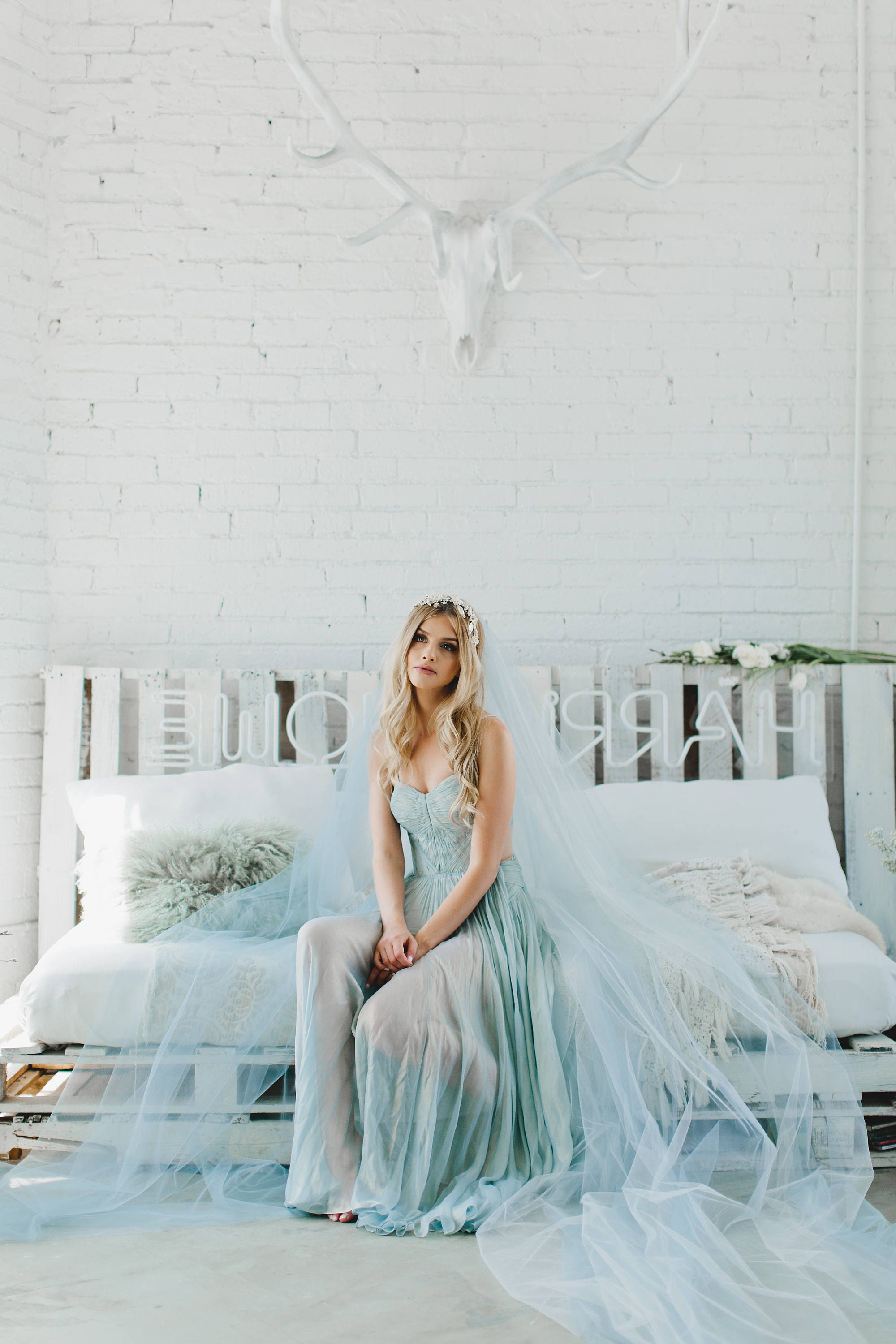Light blue two tier cathedral veil with hand-sewn textile petals and  crystals