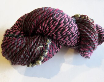 163 yds, bulky handspun yarn, 2 ply with wrapped locks, 'Trapped No. 1'