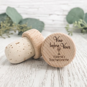 Personalized wine bottle stopper made from 100 percent real cork with an engraved wooden top with the words Vino before vows, a wine glass and the brides bachelorette info. Perfect for wedding favors, bachelorette favors and wedding shower gifts.