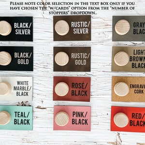 We offer a variety of colors for the stopper cards. Black with silver or gold writing. Brown with silver or gold writing. The following card colors all have black writing: gray, light brown, white marble, burgundy, engraved cork, teal, pink and red.
