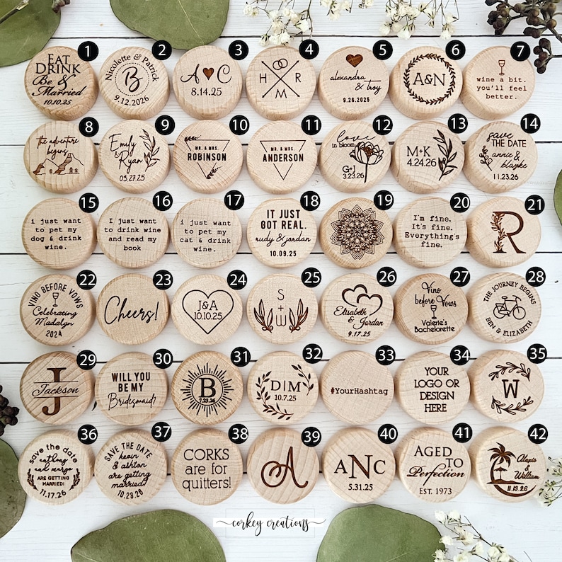 Some design options to choose from. Forty-two round wooden wine bottle stoppers with various engraved designs and text. Some of the designs include hearts, flowers, bicycles, and initials. Some of the text include names and dates, Eat Drink & be Married, initials, Cheers, wine a bit you'll feel better, and more.