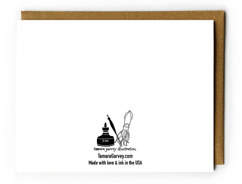 May include: A black and white illustration of an ink bottle and a squid with the text "tamara garvey illustration" and "TamaraGarvey.com" and "Made with love & ink in the USA".