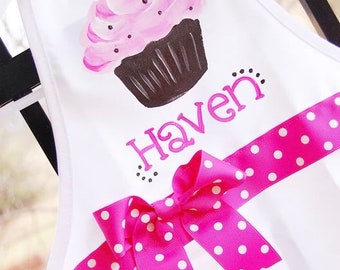 Personalized child's apron with cupcake and bow, size 1 to 6 years