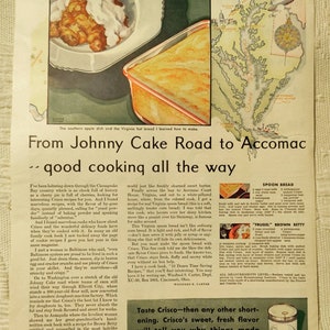 May include: An old magazine advert for Crisco shortening, featuring recipes. The image shows an apple dish with cream, a loaf of bread in a baking tin, and a map. The text promotes Crisco for cooking.