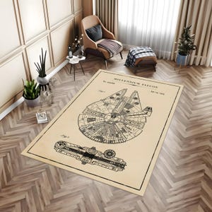 May include: A vintage-style illustration of the Millennium Falcon spaceship, a popular spacecraft from the Star Wars franchise. The illustration is in black and white and features the text "MILLENNIUM FALCON" and "Apr 19, 1979".