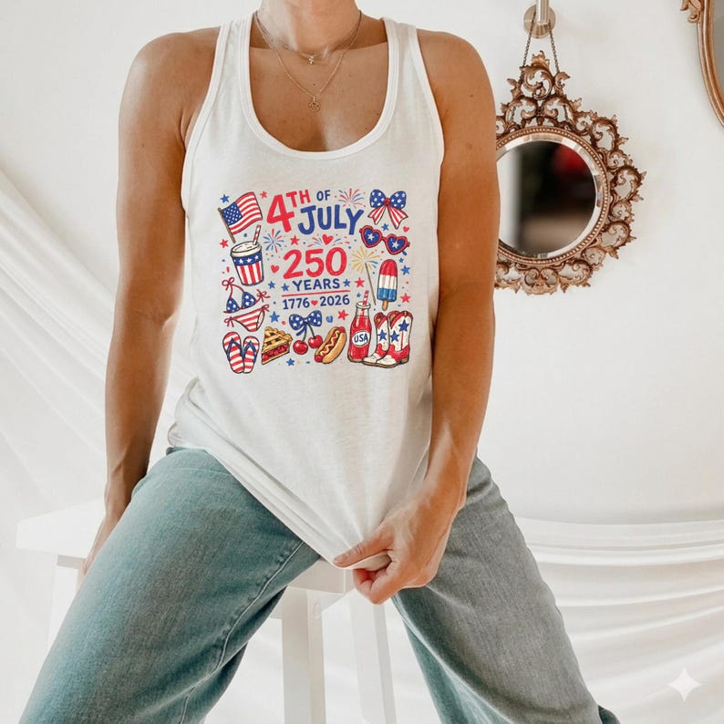A person wearing a white tank top with a graphic design celebrating the 4th of July and the 250th anniversary of the United States.