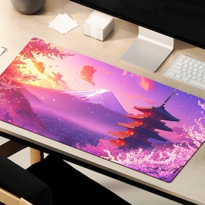 May include: A pink and purple anime-style mousepad with a Japanese pagoda, cherry blossoms, and Mount Fuji in the background.