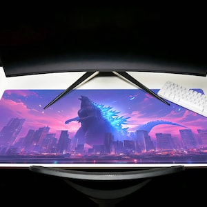 May include: A large, blue and black Godzilla monster stands in front of a city skyline at night. The monster is illuminated by a blue light and has a pink and purple sky behind it.