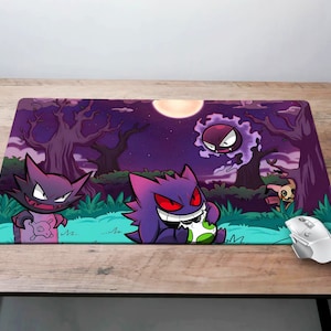 May include: A purple and black mousepad with a cartoon illustration of three Pokemon characters. The characters are Gengar, Haunter, and a Gastly. The background is a dark purple with a full moon and trees.