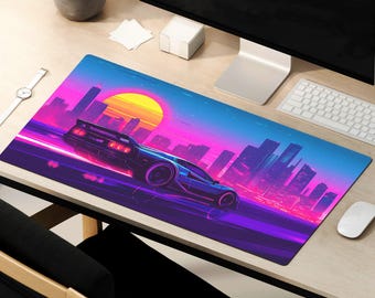 May include: A purple and blue mousepad with a retro cityscape and a black sports car driving through the city. The car has neon pink and blue accents.