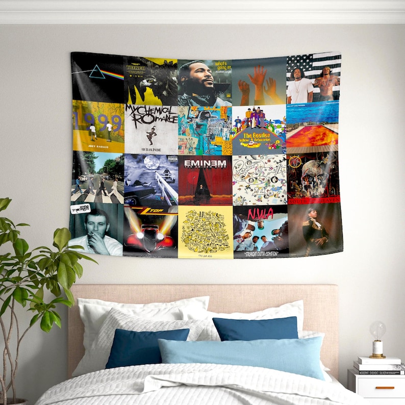 May include: A tapestry featuring a collage of album covers from various artists, including My Chemical Romance, Eminem, and N.W.A. The tapestry is made of a soft, woven fabric and has a colorful design.