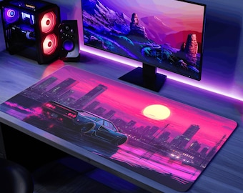 May include: A black car drives through a city at sunset. The city skyline is silhouetted against a pink and purple sky. The car has a glowing red taillight. The scene is depicted on a large, rectangular mousepad.
