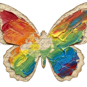 Puede incluir: Un recorte con forma de mariposa que presenta pintura al &oacute;leo espesa y texturizada en un vibrante espectro arco&iacute;ris de rojo, naranja, amarillo, verde y azul. La mariposa se superpone sobre un fondo de papel beige con escritura cursiva.