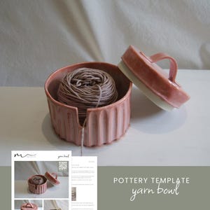May include: A pink ceramic yarn bowl with a lid and a handle. The bowl has a hole for the yarn to pass through. The bowl is sitting on a white surface. The text "POTTERY TEMPLATE yarn bowl" is visible in the image.