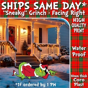May include: A cartoon image of the Grinch in a Santa suit, lying in the snow in front of a house decorated for Christmas. The text reads "SHIPS SAME DAY" and "HIGH QUALITY PRINT". The product is made of 10mm thick Coro Plast and is waterproof.