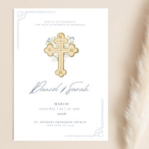 May include: A white wedding invitation card featuring a gold cross and floral details. The card announces the marriage of Daniel and Sarah, with the date, time, and location of the ceremony.