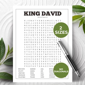 May include: A black and white word search puzzle titled "King David." The puzzle includes a list of related words and is available in two sizes. A silver pen rests on the page, and the words are arranged in a grid.